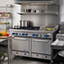 Thumbnail image #2 for Comstock-Castle 48-Inch Commercial Gas Range with 6 Open Burners, 12-Inch Griddle and 2 Space-Saver Ovens