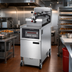 Thumbnail image #2 for Henny Penny PFG-600 4-Head Natural Gas Pressure Fryer with Built-In Filtration and Computron 1000 Control