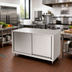 Thumbnail image #2 for John Boos 48 Inch x 36 Inch Flat Top Stainless Steel Enclosed Work Table with Cabinet Base and Sliding Doors