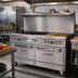 Thumbnail image #2 for Southbend Ultimate 60-Inch Gas Restaurant Range with 4 Open Burners, 36-Inch Griddle, Convection Oven, and Cabinet Base