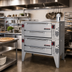 Thumbnail image #2 for Garland GPD-48-2 Double-Deck Gas Pizza/Baking Oven with Two 48 x 36 Inch Pyrorock Hearth Decks