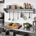 Thumbnail image #2 for Eagle Group 96-Inch x 10-Inch Wall-Mounted Stainless Steel Wall Shelf with Pot Rack and Removable Hooks