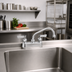 Thumbnail image #2 for Fisher Stainless Steel 4-Inch Center Deck Mount Manual Faucet with 6-Inch Swing Spout and Lever Handles