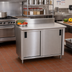 Thumbnail image #2 for Advance Tabco Special Value Series Enclosed Work Table with Cabinet Base, Sliding Doors, 48 x 24 x 40.5 Inches, 16 Gauge 304 Stainless Steel Top, 5-Inch Backsplash