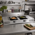 Thumbnail image #3 for TableCraft Double Induction Countertop Station Kit with 2 Drop-In Cooktops and Cooling Plates, Brushed Aluminum, 47-3/8 x 25-1/4 x 6 Inches