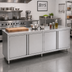 Thumbnail image #2 for John Boos 108-Inch x 24-Inch Stainless Steel Cabinet Base Work Table with 2 Sets of Hinged Doors