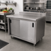 Thumbnail image #2 for Advance Tabco 60-Inch x 30-Inch Enclosed Work Table with Sliding Door Cabinet Base and 14 Gauge 304 Stainless Steel Top