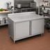 Thumbnail image #2 for John Boos 60-Inch x 30-Inch 16-Gauge Stainless Steel Enclosed Work Table with Cabinet Base, Hinged Doors, and 5-Inch Backsplash