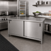 Thumbnail image #2 for John Boos 48-Inch x 24-Inch 16-Gauge 300-Series Stainless Steel Enclosed Work Table with Sliding Doors