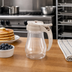 Thumbnail image #2 for Dripcut® 7 oz. Clear Polycarbonate Syrup Server with Almond Plastic Top