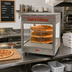 Thumbnail image #2 for Benchmark Countertop Pass-Thru Humidified Hot Food Display Case with Rotating Rack, 18-Inch Pizza Capacity