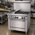 Thumbnail image #2 for Garland GF Starfire Pro 36 Inch Gas Restaurant Range with 4 Open Burners, 12 Inch Thermostatic Griddle, and Standard Oven