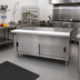 Thumbnail image #2 for Advance Tabco Triumph (Supreme) 47-1/8 Inch Solid Top Utility Station Table with Enclosed Cabinet Base, Sliding Doors, and Poly Cutting Board