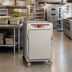 Thumbnail image #2 for Metro C5 6 Series Half-Height Mobile Heated Holding Cabinet with Solid Doors and Universal Slides, 120V