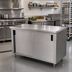 Thumbnail image #2 for Advance Tabco 48-Inch x 24-Inch Enclosed Work Table with Sliding Doors and 14-Gauge 304 Stainless Steel Top