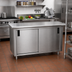 Thumbnail image #2 for Advance Tabco Special Value Economy Enclosed Work Table with Sliding Doors, 72 x 24 Inches, 304 Stainless Steel Top