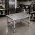 Thumbnail image #2 for John Boos Stainless Steel Equipment Stand, 48 in. W x 36 in. D x 24 in. H, 16-Gauge Top with Upturned Back and Sides