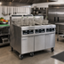 Thumbnail image #2 for Frymaster RE High Efficiency 4-Vat Electric Fryer Battery with FootPrint Pro Built-In Filtration, 80 lb. Frypots, 480V