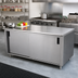 Thumbnail image #2 for Advance Tabco 96-Inch W x 36-Inch D Enclosed Work Table with Cabinet Base and Sliding Doors, 14-Gauge 304 Stainless Steel Top