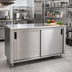 Thumbnail image #2 for Advance Tabco Special Value Series Enclosed Work Table with Sliding Door Cabinet Base, 120W x 24D, 16 Gauge 304 Stainless Steel Top