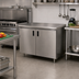 Thumbnail image #2 for Advance Tabco Special Value Economy Enclosed Work Table with Cabinet Base and Hinged Doors, 48 x 24 Inches, 16 Gauge 304 Stainless Steel Top