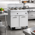 Thumbnail image #2 for 4-Battery Electric Floor Fryer with Built-In Space Saver Filter System, 50 lb. Tanks