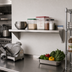 Thumbnail image #2 for BK Resources T-304 48 Inch x 12 Inch 18-Gauge Stainless Steel Wall Shelf with 1-1/2 Inch Rear Turn-Up