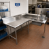 Thumbnail image #2 for Advance Tabco Korner-Soil L-Shaped Left-Hand Dishtable with Pre-Rinse Sink, 119 Inch, 304 Stainless Steel
