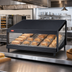 Thumbnail image #2 for Hatco Glo-Ray 60-Inch Countertop Pass-Through Merchandising Warmer with Slanted Shelf, 12 Rods, and Infrared Top Heat