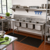 Thumbnail image #2 for Advance Tabco Regaline 4-Compartment Sink with 24-Inch Left-Hand Drainboard, 20 x 28-Inch Bowls, 14-Gauge 304 Stainless Steel