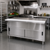 Thumbnail image #2 for Advance Tabco Triumph Supreme Solid Top Utility Station with Sliding Door Cabinet Base and Cutting Board