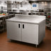 Thumbnail image #2 for Advance Tabco Cabinet Base Enclosed Work Table, 72 x 36 Inches, 14-Gauge 304 Stainless Steel Top, 5-Inch Backsplash