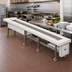 Thumbnail image #2 for Dinex DXIESSB20 20-Foot Lexan Slat Belt Motorized Tray Make-Up Conveyor