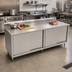 Thumbnail image #2 for John Boos 108-Inch x 30-Inch Stainless Steel Work Table with Cabinet Base, Sliding Doors, and 5-Inch Backsplash