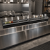 Thumbnail image #2 for Glastender 84-Inch Double Stainless Steel Speed Rail with Open Step-and-Rail Design