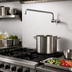 Thumbnail image #2 for Manual Wall-Mount Pot Filler Faucet with 10-Inch Swing Spout and Wrist Handle