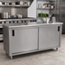 Thumbnail image #2 for Advance Tabco Special Value Series Enclosed Work Table with Cabinet Base, Mid-Shelf and Sliding Doors, 108 x 24 Inches, 16 Gauge 304 Stainless Steel Top