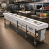 Thumbnail image #2 for Dinex DXIESB18 18-Foot Dual Band Belt Tray Make-Up Conveyor