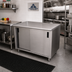 Thumbnail image #2 for Advance Tabco Special Value Series 48-Inch x 24-Inch Stainless Steel Enclosed Work Table with Sliding Door Cabinet Base