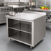 Thumbnail image #2 for Advance Tabco 60 Inch x 30 Inch Work Table with Open Front Cabinet Base, Mid-Shelf, 14 Gauge 304 Stainless Steel Top, and 1-1/2 Inch Rear Up-Turn