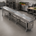 Thumbnail image #2 for Dinex DXIESSB18 18 ft. Slat Belt Motorized Tray Make-Up Conveyor