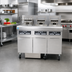 Thumbnail image #2 for Frymaster RE High Efficiency 3-Tank Electric Fryer Battery with Built-In Filtration, 50 lb Full Frypots, 17 kW Each