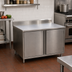Thumbnail image #2 for BK Resources 18 x 24 Inch Stainless Steel Cabinet Base Work Table with Hinged Doors, Lock, and 5 Inch Backsplash