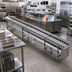 Thumbnail image #2 for Dinex DXIESSW10 10-Foot Stainless Steel Skate Wheel Tray Make-Up Conveyor
