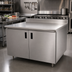 Thumbnail image #2 for Advance Tabco Special Value Economy Enclosed Work Table with Cabinet Base, 108 Inch W x 30 Inch D, 16 Gauge 304 Stainless Steel Top, 5 Inch Backsplash