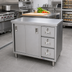 Thumbnail image #2 for Omcan Enclosed Stainless Steel Work Table with Sliding Doors and 3 Drawers, 48 x 30 x 36 Inches