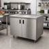 Thumbnail image #2 for Advance Tabco 36-Inch x 24-Inch Enclosed Work Table with Cabinet Base, Mid-Shelf, Hinged Doors, and 14-Gauge 304 Stainless Steel Top
