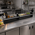 Thumbnail image #2 for Glastender 64-Inch Single Stainless Steel Speed Rail with Open Step-and-Rail Design