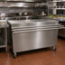 Thumbnail image #2 for BK Resources 60-Inch x 30-Inch Stainless Steel Serving Counter with Sliding Door and Drop Shelf