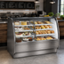 Thumbnail image #2 for True 59-1/4 Inch Dual Zone Curved Glass Full Service Merchandiser with Self-Contained R290 Refrigeration, Stainless Exterior, White Interior